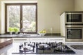 Kitchen granitic worktop with a cooker