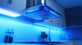 Modern kitchen with futuristic blue led lighting Royalty Free Stock Photo