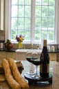 Kitchen island with wine baguettes Royalty Free Stock Photo