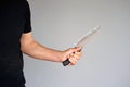 Kitchen knife in a hand Royalty Free Stock Photo