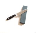 Kitchen knife and sharpening stone on a white background- image Royalty Free Stock Photo