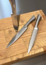 Kitchen knives on a cutting board Royalty Free Stock Photo