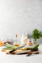 Kitchen knives are lying on a cutting board during the vegetarian cooking process Royalty Free Stock Photo