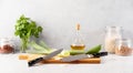 Kitchen knives are lying on a cutting board during the vegetarian cooking process Royalty Free Stock Photo