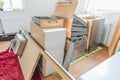 Kitchen laid out in the living room, disassembled into individual parts