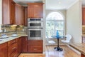 Kitchen in luxury home with stainless steel appliances,. Royalty Free Stock Photo