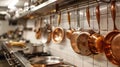 A kitchen with many pots and pans hanging on the wall, AI Royalty Free Stock Photo