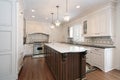 Kitchen with marble and wood island