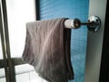 Kitchen microfiber cloth drying at the window mounted aluminium and pvc pipe towel rack. Home DIY project hack to the window