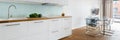 Kitchen with modern dining area, panorama Royalty Free Stock Photo