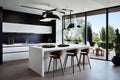 Kitchen in new luxury home with quartz waterfall island, hardwood floors. Royalty Free Stock Photo