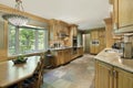 Kitchen with oak wood cabinetry Royalty Free Stock Photo
