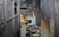 Kitchen with an old oven burned out after a fire in a house. Royalty Free Stock Photo