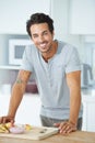 Kitchen portrait, fruits and happy man cooking healthy food, home recipe or clean eating snack, morning breakfast or Royalty Free Stock Photo