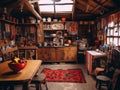 A kitchen with pots and pans from the ceiling. Authentic interior of a wooden house