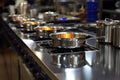 Kitchen precision Stainless steel pots arranged on the restaurant stove Royalty Free Stock Photo