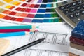 Kitchen project with palette, tabletop samples, pencils and calc Royalty Free Stock Photo