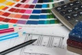 Kitchen project with palette, tabletop samples, pencils and calc Royalty Free Stock Photo