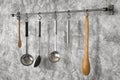 Kitchen rack hanging with kitchen utensils