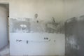 Kitchen reconstruction. New wall plaster and plumbing Royalty Free Stock Photo