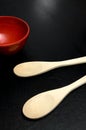 Kitchen Red Measuring Bowl and Wood Spoons Royalty Free Stock Photo