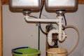 Kitchen Remodel Closeup of Under Sink Plumbing with Buckets Royalty Free Stock Photo
