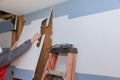 Kitchen renovation in progress with removed old sheetrock preparing for new cabinet installation Royalty Free Stock Photo