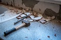 Kitchen renovation. Work Tools on a kitchen board and broken wall ceramics Royalty Free Stock Photo
