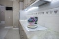 Kitchen room interior details, marble countertops and ceramic tiles