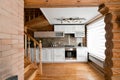 The kitchen room in a rustic log cabin, in the mountains. with a beautiful interior. house of pine logs Royalty Free Stock Photo