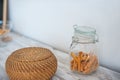 Kitchen in rustic style in summer. Spring light textured kitchen with an old fridge, wooden table. Transparent glass jar with cook Royalty Free Stock Photo