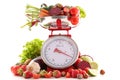 Kitchen scale with fruit and vegetable Royalty Free Stock Photo