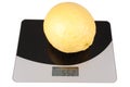 Kitchen scale with giant lemon Royalty Free Stock Photo