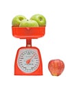 Kitchen scale weighting apples Royalty Free Stock Photo