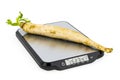 Kitchen Scales with Daikon radish. 3D rendering