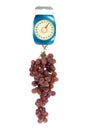 Kitchen scales and red grapes. Royalty Free Stock Photo