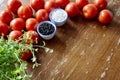 Kitchen scene with tomatoes and herbs Royalty Free Stock Photo