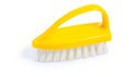 Kitchen scrubbrush with yellow handle isolated on Royalty Free Stock Photo