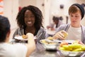 Kitchen Serving Food In Homeless Shelter