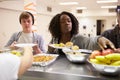 Kitchen Serving Food In Homeless Shelter