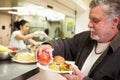 Kitchen Serving Food In Homeless Shelter Royalty Free Stock Photo