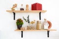 Kitchen shelfs with spices, autumn white interior Royalty Free Stock Photo