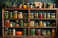 Kitchen shelves topped with lots of bottles and jars with canned food. Vegetables in jars. Royalty Free Stock Photo