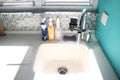Kitchen sink and running water Royalty Free Stock Photo
