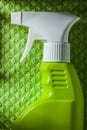Kitchen sprayer on green dishcloth Royalty Free Stock Photo