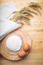 Kitchen still life from flour, wheat ears and eggs Royalty Free Stock Photo
