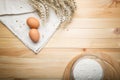 Kitchen still life from flour, wheat ears and eggs Royalty Free Stock Photo