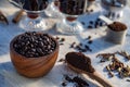 Kitchen still life with whole coffee beans, ground coffee, coffee grinder, glass mugs filled with black coffee, Royalty Free Stock Photo