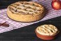 Kitchen table with apple pies. Traditional baked dessert. Sweet Royalty Free Stock Photo