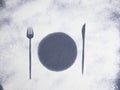 Kitchen table background with flour and imprints of fork, plate and knife. Abstract kitchen background. Flour pattern Royalty Free Stock Photo